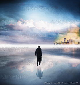 Man walking in the clouds. - Picture of a man in a suit walking in the clouds...... High hopes and big dreams!