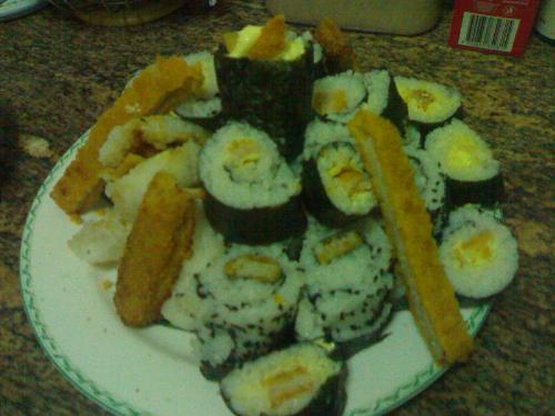 Sushi plates - This is sushi that I made with friends. That was lots of fun. Look at it. I design it. I made the arrangement to make it look like it! Good enough? hehe