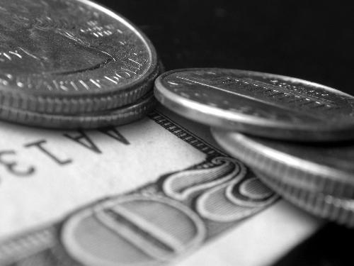 Money in Black and White - A picture of a twenty dollar bill ($20) and some quarters. Photo is in Black and White. Although it&#039;s not a lot of money, it&#039;s a really nice picture!

A royalty-free photo from StockXchange, www.sxc.hu