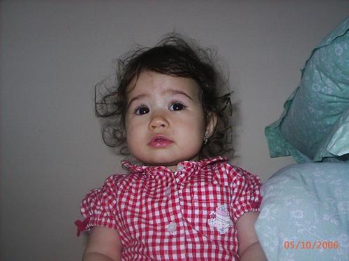 I think that is very important to have kids,in thi - I think that is very important to have kids,in this picture is my grannddaughter when she was very little.She is very beautiful,she has her mothers eyes and her fathers mounth,and she is growing up very fast.You must to see her,she is like an angel,and she is the first granddaughter in our family.We all love her very much.I hope that when she will grew up she will be beautiful.