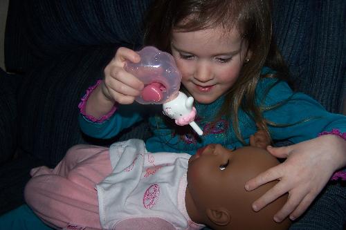 Daughter playing with Black Baby - I have bought dolls of different ethnicities to create exposures for my children. Daughter playing with Black Baby - I have bought dolls of different ethnicities to create exposures for my children.