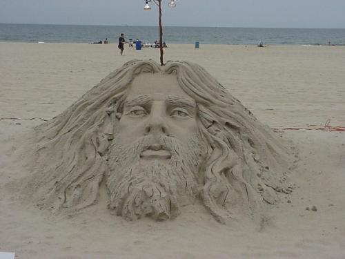 Jesus on the Beach - This is a sand sculpture of Jesus on the beach.