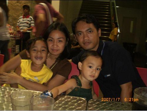 my family - this picture was taken at the sm mall of asia where we celebrate our 7th year anniversary. where we also watch the world pyrolympics competition.