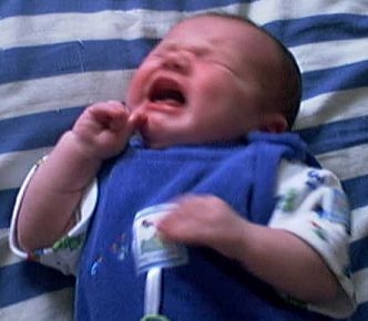 crying baby - a baby crying in his sleep
