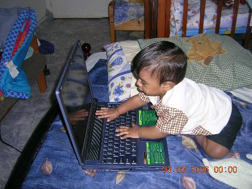 My First Laptop - 11 month old child with his laptop