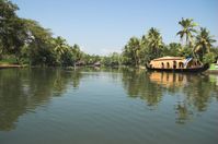 kumarakom.house boats in kerala - Kumarakom is a lovely place with migratory birds and house boats.