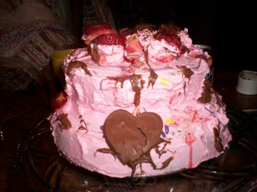 Birthday Cake - My daughters 13th birthday cake, they don't like store bought cakes only homemade. The chocolate heart cracked but she still loved it.