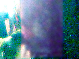 snapshot of a face of a creepy old lady - it was taken with my cellphone camera sony ericsson t68i,last 2years ago.i clear the image and ,highlighted.and this is it another ghost.