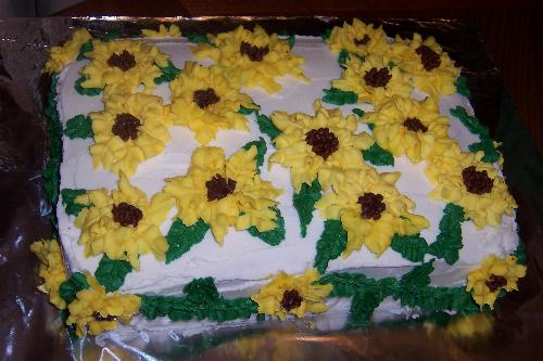 Sunflower cake - This is a picture of the sunflower cake my daughter and I made for her 21st birthday. The cake mix was store bought, but I made the icing from scratch.