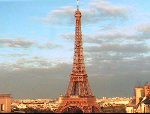 paris france  - Paris , France at dawn, sun is raising and shining slowly on the Eiffel Tour. tourists travel photos.