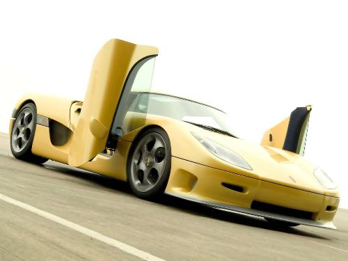 World's fastest car the Koenigsegg CCR. - The Koenigsegg CCR is an automobile and super car made by Koenigsegg. Designed and manufactured in Sweden, it debuted at the 2004 Geneva Auto Show. It briefly held the world speed records for a production car.  The manufacturers claim the CCR is the fastest road car in the world, with a thoeretical top speed of more than 385 km/h (240 mph). On February 28,2005, at 12.08 local time, the Koenigsegg CCR broke the production road car speed record, achieving a new official top speed of 387.87 km/h (241 mph) at Italy's Nardo Prototipo proving ground.