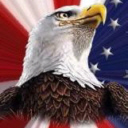 America the Beautiful - photo of the bald eagle with the american flag in the background.