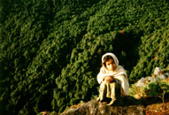 Nepal little girl - This is a shot of a little girl we found perched over a sheer drop one morning when we got out of bed. She let me take a photo and then came and had breakfast with us, then dissappeared again.