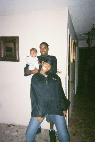 smiling and laughing always helps - My giant nephew, me and my son having fun at my mom's house.