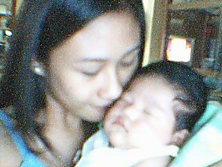 my baby - this is me with me lovely angel, Katrina Laurice. she's only a month and a half when this picture was taken.