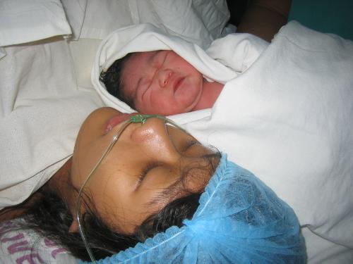 baby's here! - this picture was taken inside the operating room. i was still unconcious at that m.