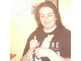 Madwitch and Aurora - Me with one of my rats. The look of terror is the fact that a camera is pointing at me