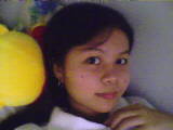 lying on pooh - i was hanging out in my friend's bedroom and i was lying on her stuff toy winnie the pooh.. at that time, my friend and i were resting because we would need the energy for our coming exam. hehehe! i just took this shot for fun.