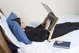 Using a Laptop in bed - As personal computers,  laptops are capable of the  same tasks as a desktop PC