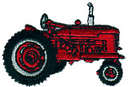 Country Living - Photo of an old red tractor to depict country life