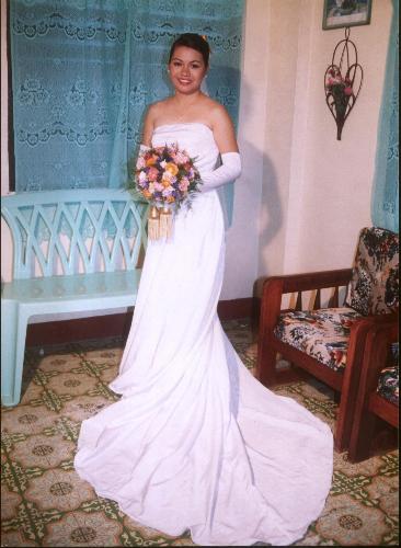 my lovely beautiful wife - this photo was taken at their house before going to church