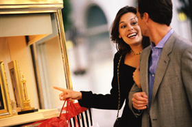 Couple doing shopping - A couple doing window shopping