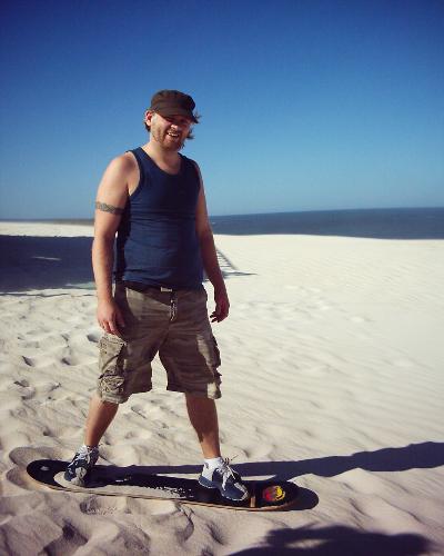 Sand boarding - Me sandboarding in the Australian desert