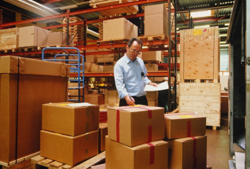 Working in Factory - Person working in a warehouse department of factory