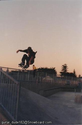 Skate boarding - Ollie over transition.  Marysville WA Skatrpark ~2001
