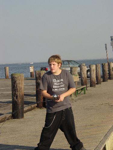 My oldest - This is my oldest son, fishing off a pier in New York.  The fish of the day was puffers!