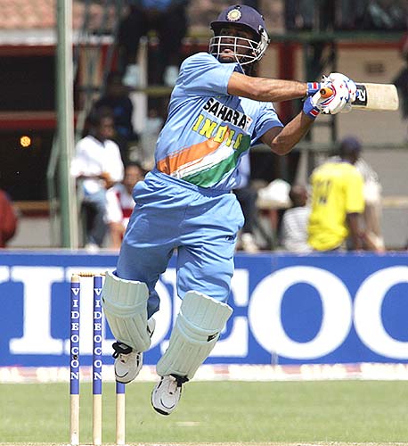 Dhoni - hitting six jumping in the air