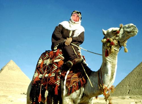 amira riding camel - my grand daughter is riding camel how is it?