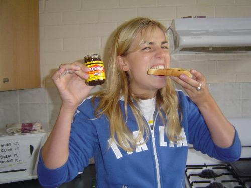 Australian pride: VEGEMITE! - My friend Meg having a bit at a vegemite toast...could it get more australian? :)