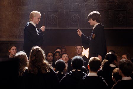 Harry Potter and his bravery - The photo shows the incident in the second year of Harry Potter when he takes on Malfoy in a duel.Even though he does not know any good fighting spells he is brave and faces his opponent without fear.He also faces the snake and talks Parseltongue(snake language) during the duel.