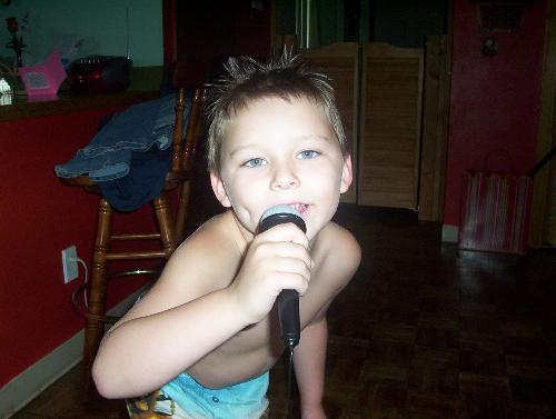 Dalton - This is my sweet son dalton he loves to sing and he want to go to hollywood!!! He has a very warm heart and he sings everyday we gave him a guitar for christmas and he loves it!!!