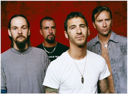 Godsmack just keeps on banging your head -  The Boston-based alternative metal group Godsmack originally comprised vocalist Sully Erna (a devout Wiccan), guitarist Tony Rambola, bassist Robbie Merrill, and drummer Tommy Stewart. After debuting in 1997 with All Wound Up, Godsmack signed with Universal, which in 1998 reissued the LP as a self-titled effort with a handful of new tracks; at that point Stewart -- who'd left the group in mid-1997 and was replaced by drummer Joe d'Arco -- returned to the lineup on a permanent basis. The band's audience built slowly but surely, and Godsmack was certified gold in 1999, the same year the group was invited to join the Ozzfest tour; by the next year, it had sold over three million copies, thanks to hit singles like 'Whatever' and 'Keep Away.' In 2000, the group again played Ozzfest, and released their second proper album, Awake, that fall. In January 2001, Awake earned the band a Grammy nomination for Best Rock Instrumental Performance for the song 'Vampires,' and by March, it had sold two million copies. Hot on the heels of their continuing success, their single 'I Stand Alone' propelled the hype of the movie The Scorpion King in March 2002. As the single maintained Godsmack's strong presence at modern rock radio into the summer, founding member Tommy Stewart left the band in June. The David Bottrill-produced (Peter Gabriel, Tool, Mudvayne) album Faceless appeared in April 2003. It also marked the debut of ex-Amen drummer Shannon Larkin. The all-acoustic Other Side arrived in spring 2004. In 2006, Erna stepped behind the board to helm IV, a collection of new material that reached number one while both retaining the group's trademark heft and expanding their sonic palette.