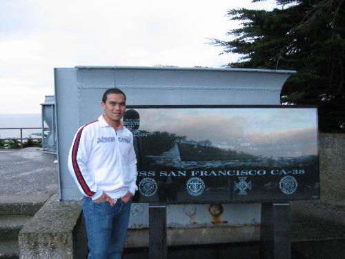 Arnold in San Francicso - Posing in from of the Memorialfor the USS San Francisco