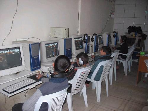 kids photo of playing counter strike - are you glad looking at them more concentrated to games than study