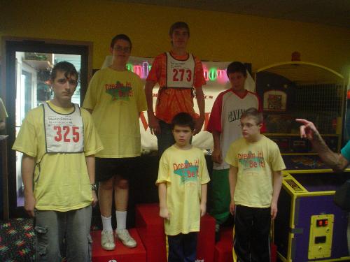 CJ at Special Olympics Bowling; he's the one at bo - His first Special Olympic event; Bowling. He received a 6th place ribbon.