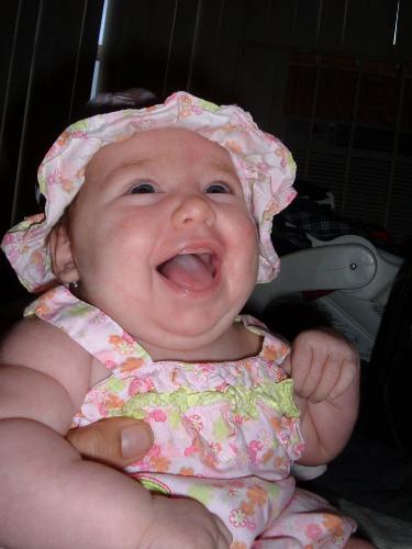 Aradia laughing out loud - She is looking up at me (not shown in picture) because I am making faces at her. This is the first time that we got her to laugh for the camera.
