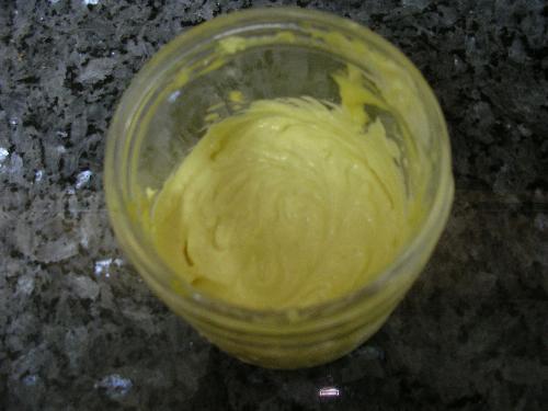 Homemade Mayonnaise - It is very easy to make mayonnaise at home, and takes only minutes.    1 egg, poached 30 seconds in boiling water  (the poaching step is not necessary, but may  make some feel better that the egg is no longer raw)   5ml (1 tsp.) Dijon mustard (do not substitute another kind)   Juice of 1 lemon, strained  2ml (scant 1/2 tsp.) smoked sweet Spanish paprika  5ml (1 tsp.) salt  Freshly ground white pepper (black pepper leaves ugly specks in the mayo)   275-400ml (1 1/2-2 cups) extra virgin olive oil   Put the egg, lemon juice, Dijon mustard, smoked paprika, salt and pepper in the blender and whiz until smooth.  With the blender running, add oil a drop at a time until it begins to emulsify, then start adding oil in a very thin drizzle.  Stop adding oil if too much collects on the surface and wait for it to emulsify.  The amount of oil you use depends on the size of the egg and the weather.  You know the maynnaise is done when it thickens and makes a loud 'schhluupp!' noise.    You will notice that the mayonnaise is not white like commercial mayonnaise, but a lovely yellow.  If you use organic eggs from free-range chickens whose yolks are a deeper yellow than those of factory-farmed eggs, the mayonnaise will be an even richer color.  The best extra virgin olive oil is green, and that, too, colors the mayonnaise.    Variation: For green mayonnaise, put a handful of fresh flat-leaf parsley leaves in with the egg and lemon juice (before adding the oil).  Usse as you would commercial mayonaise, in salads and sandwiches and on steamed vegetables.  Notice how much better it tates!