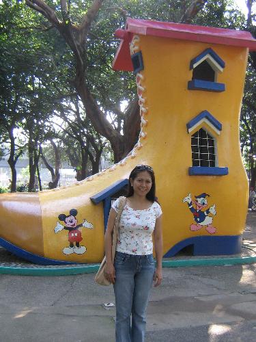 Im Dreaming of Disneyland - I went to Manila...and this is where i end up in disneyland!? nope..just a smaller version of the place. im in the children's playground here in luneta park. this was taken last Sept. 2006. I wish i have more time to look around inside the big shoe house. WEll, next time...there's always 2nd chances.