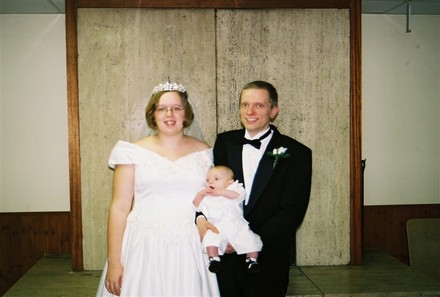 my happy lil family! - this is me my husband, and our son on our wedding day!