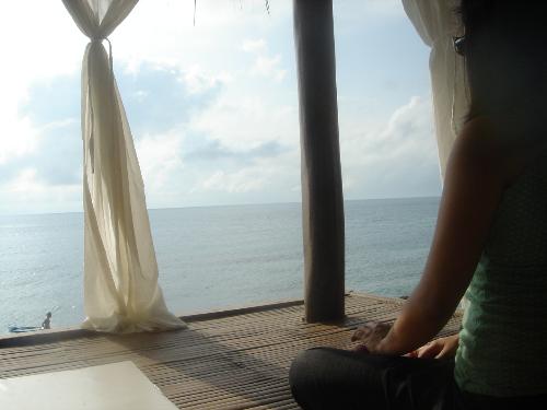 tranquility - It's the peace and tranquility that you get when you're in the beach looking out to the vast oceans. A time to forget all your worries and stress behind and enjoy the moment.