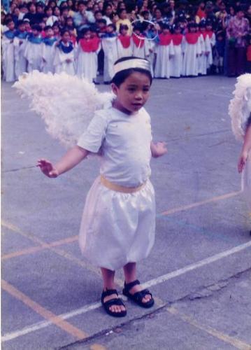 cute little angel - my cousin karl in angel costume when he is in his grade school..isn't he cute and cuddly??