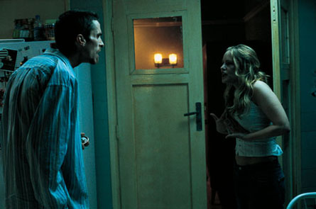 The Machinist Pictures - Brad Anderson directs the psychological thriller The Machinist, a production of Spain's Filmax company. Christian Bale plays Trevor Reznik, a factory lathe operator who has developed a serious case of insomnia. Lack of sleep has already started to wear down on his brain and his body. When he's involved in an accident at work, his co-workers turn against him. He starts to find strange notes in his apartment and see people that apparently aren't there. Jennifer Jason Leigh stars as call girl Stevie.