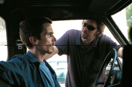 The Machinist Pictures - Brad Anderson directs the psychological thriller The Machinist, a production of Spain's Filmax company. Christian Bale plays Trevor Reznik, a factory lathe operator who has developed a serious case of insomnia. Lack of sleep has already started to wear down on his brain and his body. When he's involved in an accident at work, his co-workers turn against him. He starts to find strange notes in his apartment and see people that apparently aren't there. Jennifer Jason Leigh stars as call girl Stevie.