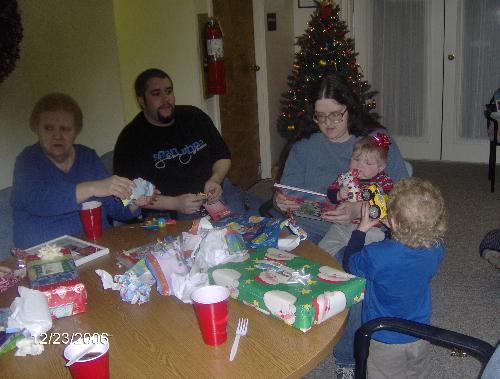 Me,my mom,my son, and my two grandson's - A four generation picture at Christmas of me, my mom, my son and my two grandsons