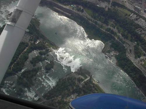 The top view of the great Niagra Falls - America has some of the most beautiful geographical landmarks....one of them is called the niagra falls...It is the highest waterfalls in the world and tourists visit this place all around the year...In the downwaters of these falls many water sports are played ....It is the highest one and attracts lots of people towards it!!!