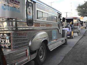 PUJ -Public Utility Jeepney - PUJ are raely used here in the philippines. This is where filipinoes ride going to some places and this is a means of transportation. The Minimum fare on Jeepneys are 7 pesos, that is 7.00 or 7 philippines moneys. The fare varies depending on the distance the person might travel. This is a non-airconditioned vehicle but people here in the philippines as far used with it.